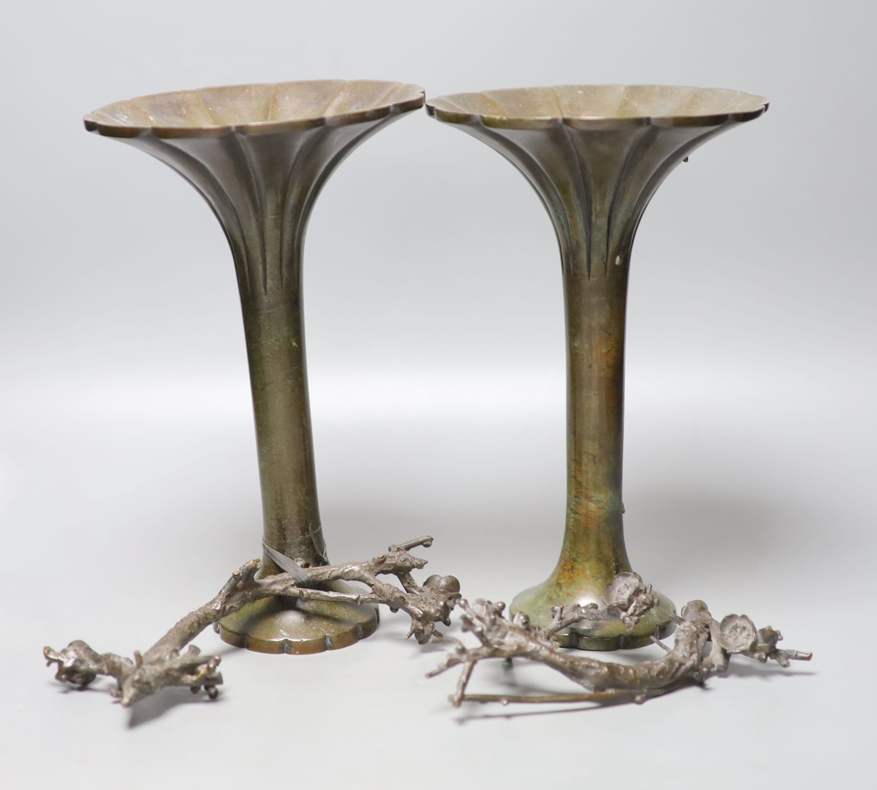 A pair of Japanese bronze two handled prunus vases, height 18cm